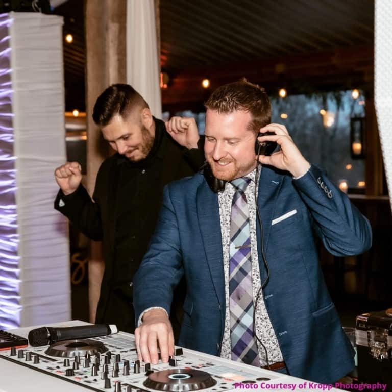 DJ Don mixing music at a wedding.
